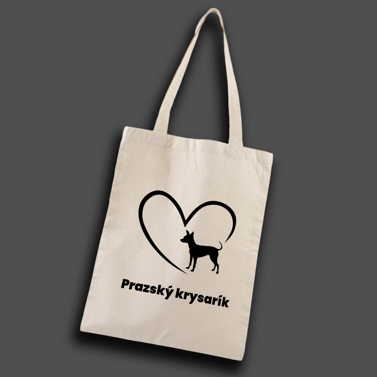 foto på tygkasse med konturer av ett hjärta, del av hjärtat har silhuett av en hund. Under hjärtat står texten: "prazsky krysarik"