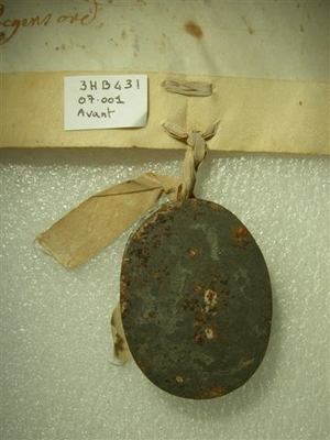 Corrosion of lead on the surface of a papal bull.