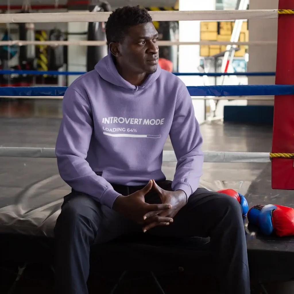 Man wearing a digital lavender Just Hoods hoodie with white Introvert Mode print