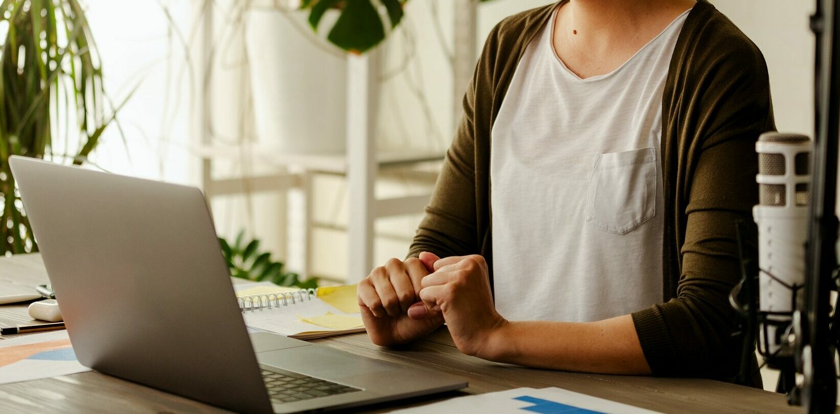 Businesswoman working from home making a video call. Female having a zoom call with colleagues.