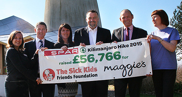 Spar team present cheque for £56,766