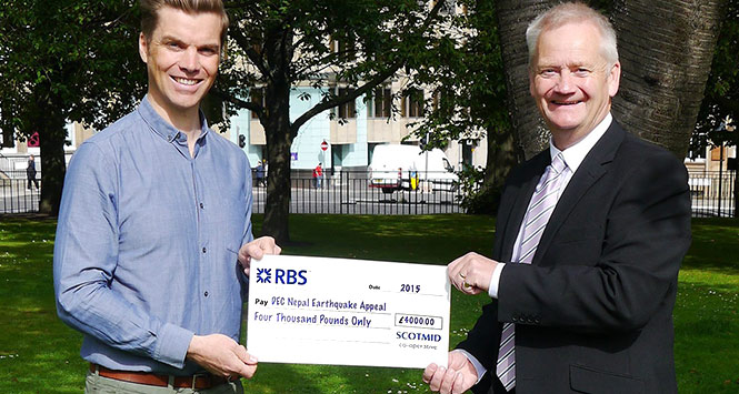 Scotmid £4,000 cheque presented to DEC