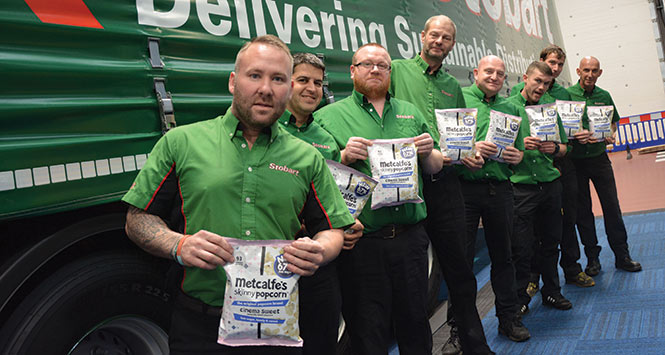 Eddie Stobart drivers holding Metcalfe's skinny popcorn