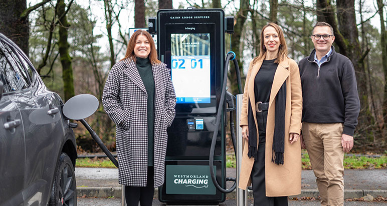 People at EV charging point