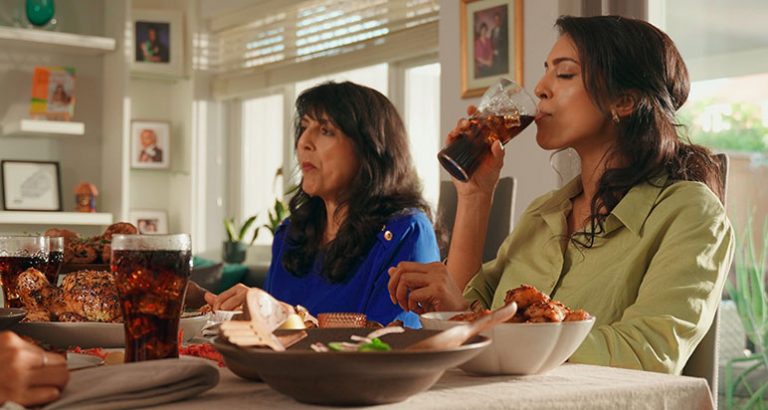 People consuming soft drinks