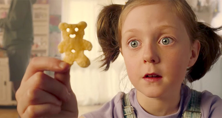 Girl holding Pom-Bear