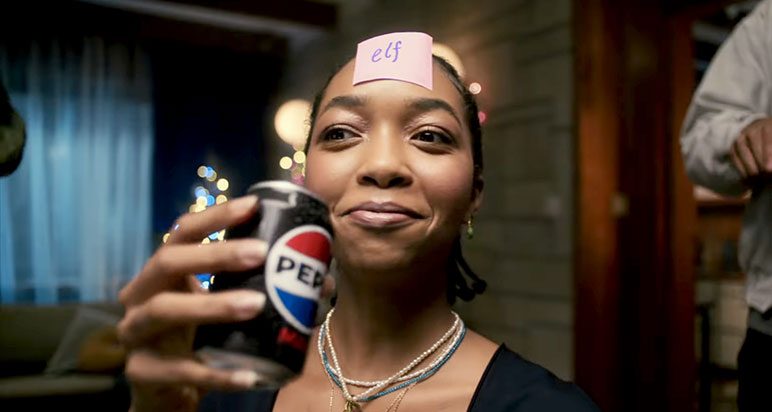 Woman drinking Pepsi Max