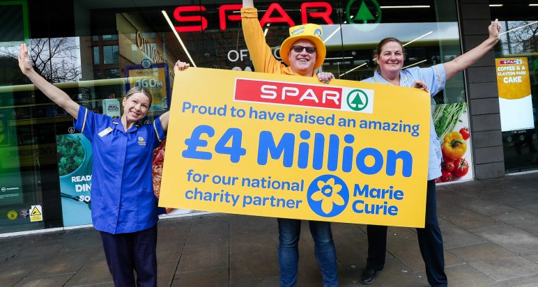 L-R: Outside SPAR City Tower, Manchester, Marie Curie Registered Nurse, Jennie; Marie Curie Community Fundraiser Matt Otty; and Marie Curie Healthcare Assistant, Linda, celebrate Spar's fundraising achievement.