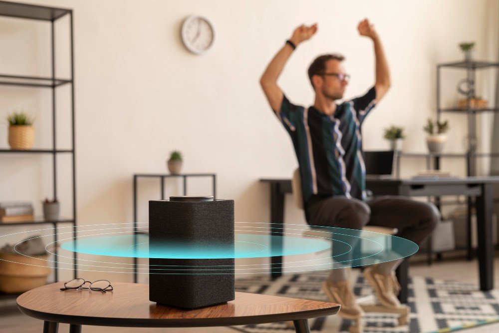 full shot man dancing with speakers