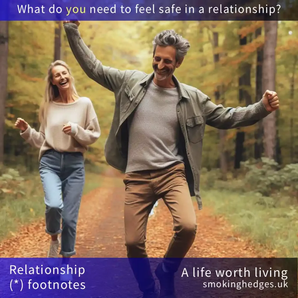 A man and a woman dancing on a forest path in autumn.