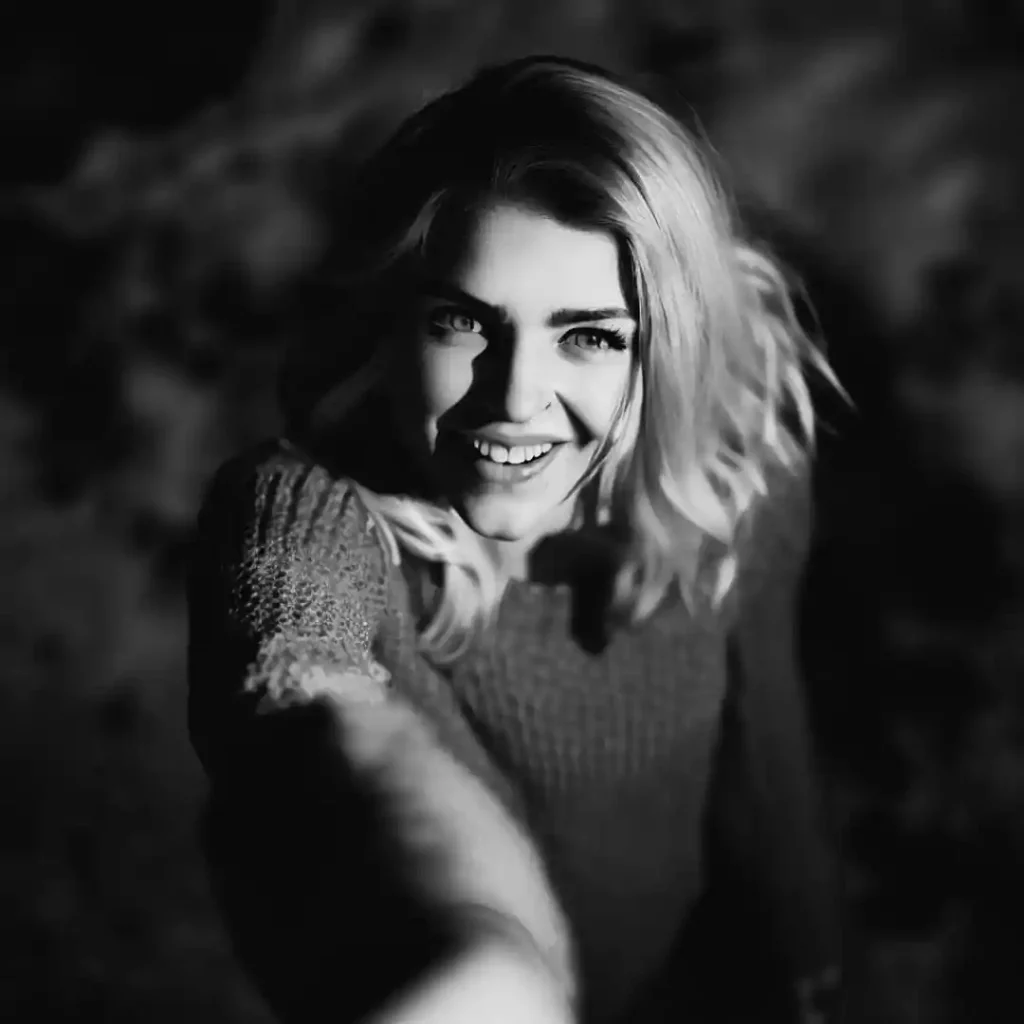 A young woman taking a selfie