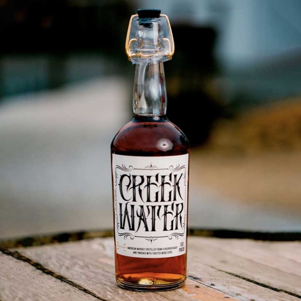 CREEK WATER 100 PROOF AMERICAN WHISKEY