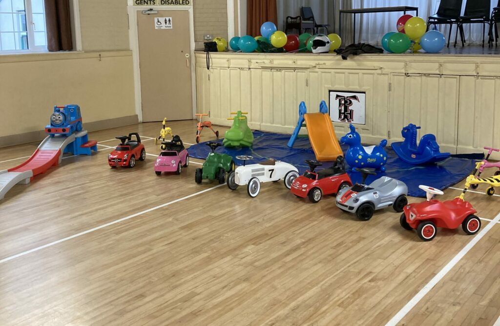 Selection of Ride On Toys for Toddler Party in Twyford Village Hall