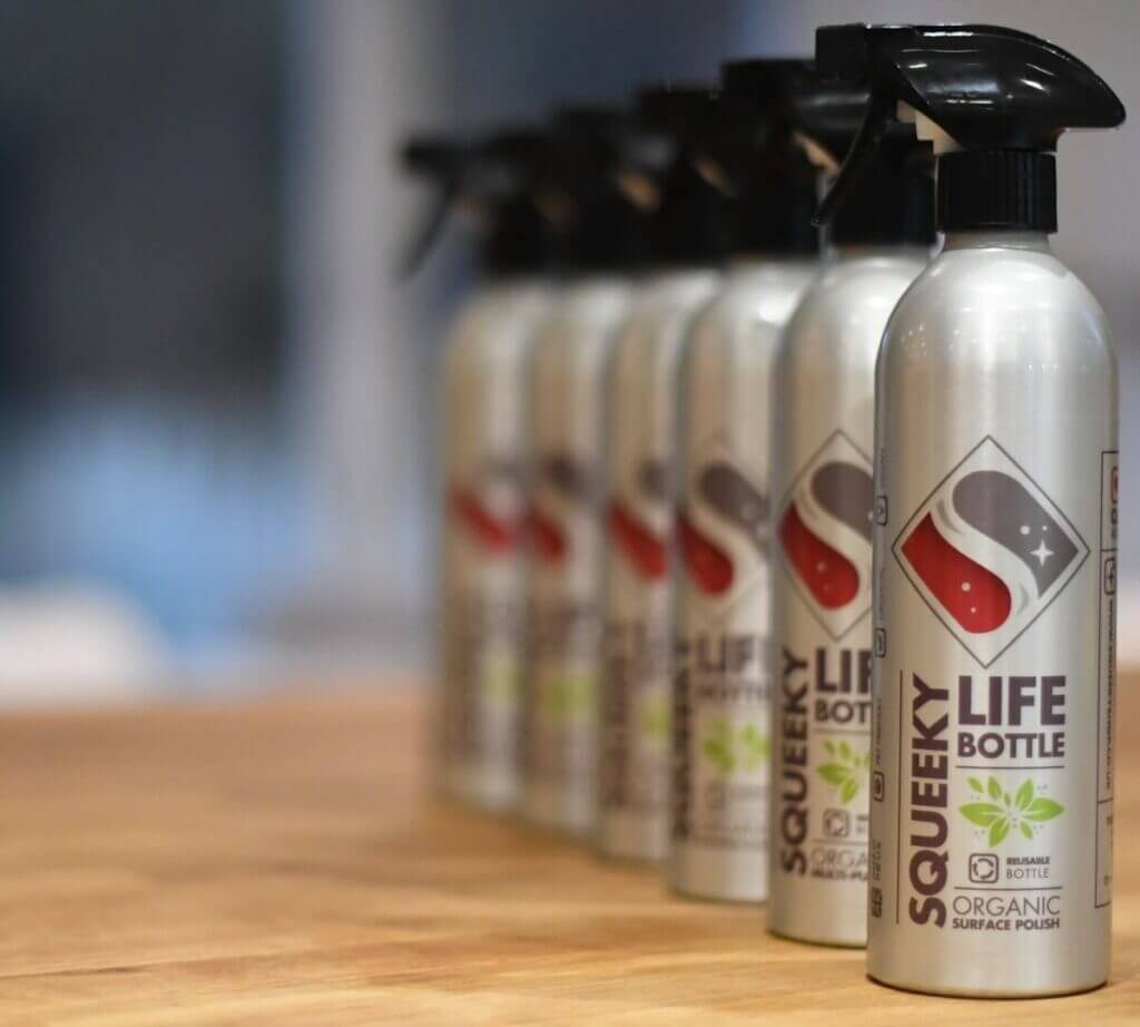 Six Squeeky life bottles on worktop.