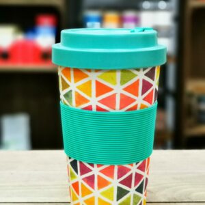 Bamboo Travel Mug with triangle multi colour design on wooden crate