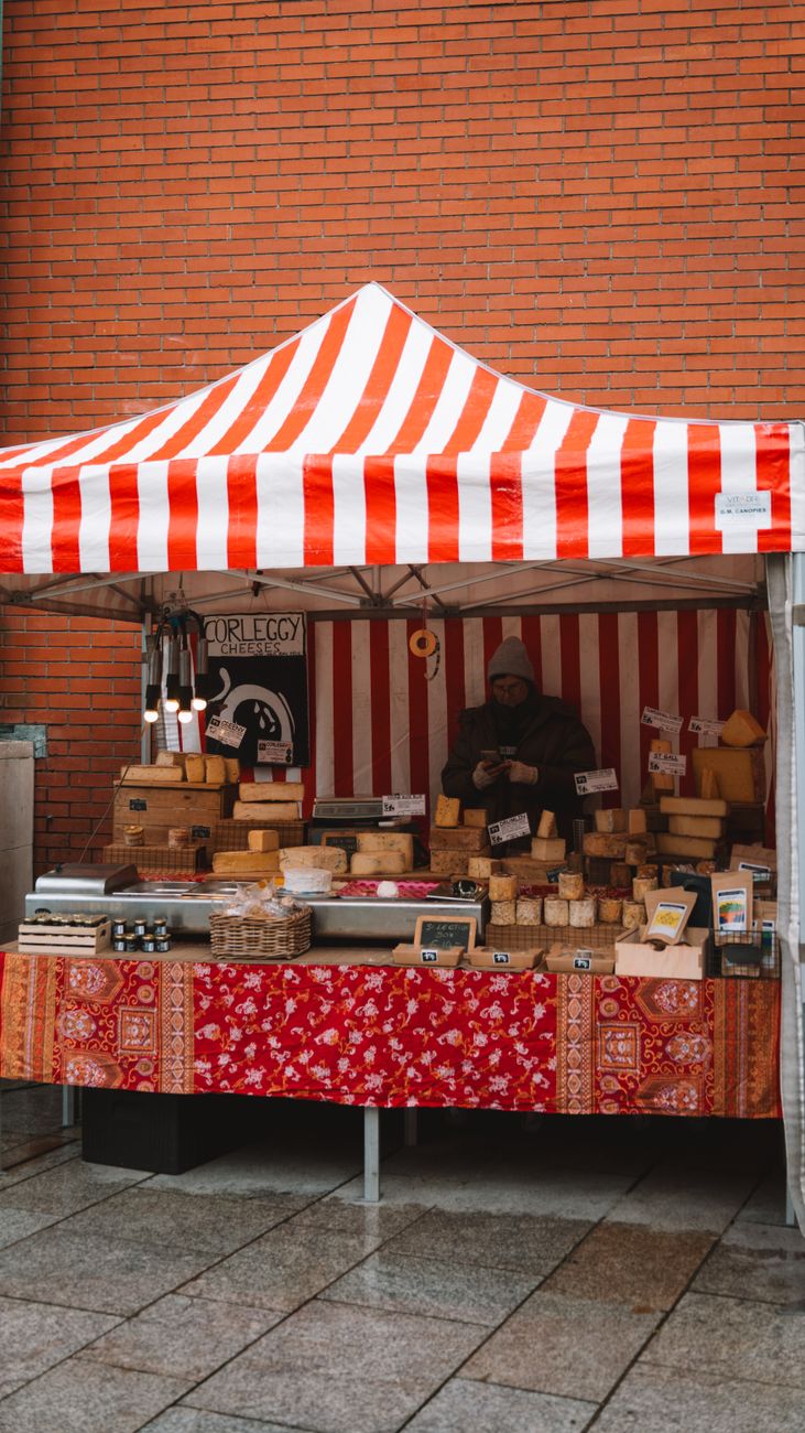 man at stall in town