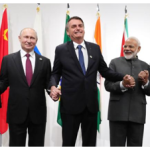 Chinese President Xi Jinping, Russian President Vladimir Putin, Brazilian President Jair Bolsonaro, India's Prime Minister Narendra Modi and South African President Cyril Ramaphosa pose during a BRICS meeting held during a G20 summit in Osaka in June 2019.