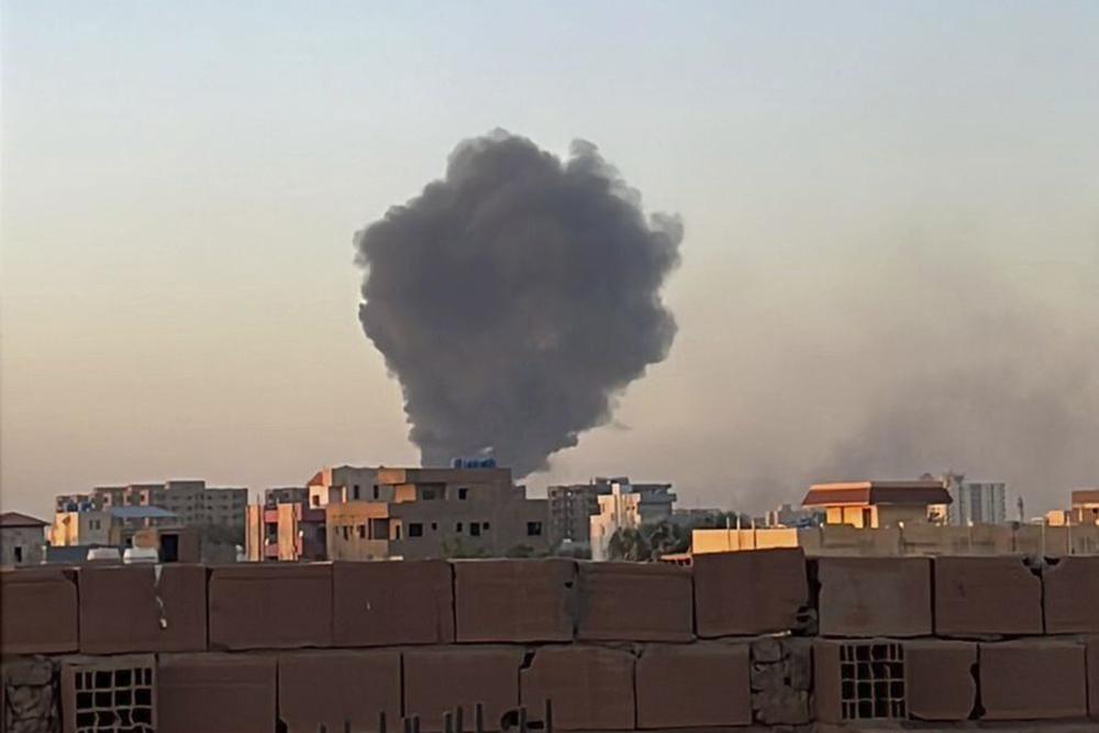 US diplomats evacuated from Sudan: In this image captured by Maheen S, thick smoke envelops the sky near Doha International Hospital in Khartoum, Sudan, on Friday, April 21, 2023. The usually festive Muslim holiday of Eid al-Fitr, marked by prayer, celebration, and feasting, was marred by gunfire and heavy smoke that blanketed the skyline in the Sudanese capital of Khartoum. (Maheen S via AP)