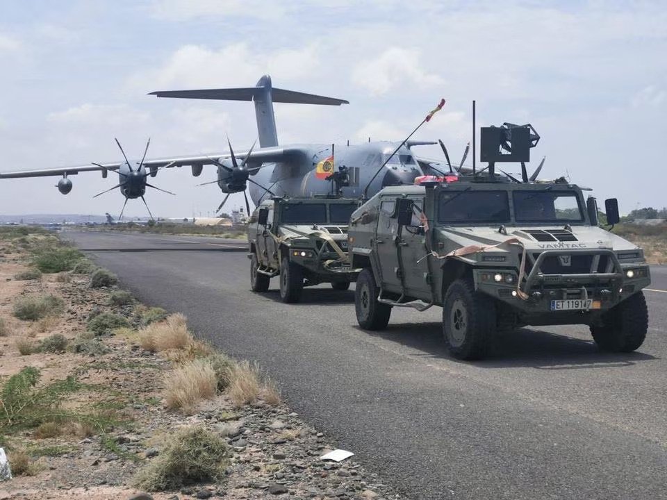 A Spanish military plane and military vehicles are seen departing on the tarmac as Spanish diplomatic personnel and citizens are being evacuated from Khartoum, Sudan on April 23. (Photo credit: Spanish Defence Ministry via REUTERS)