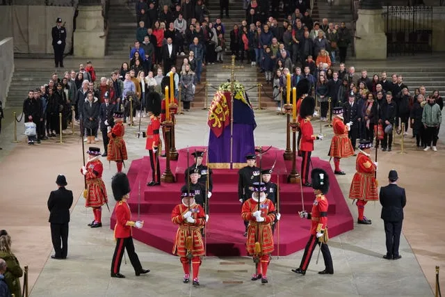 The late Queen’s coffin lying in state