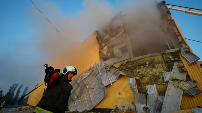 Firefighters Tackle Aftermath of Largest Drone Attack Since Russian Invasion, Kyiv