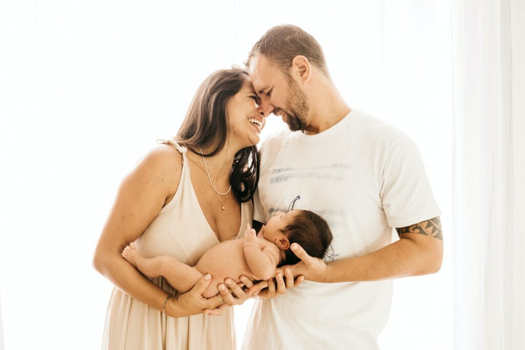 The Global Day of Parents: Celebrating the Vital Role of Parents in Shaping the Future of Society man in white crew neck t-shirt kissing woman in white dress