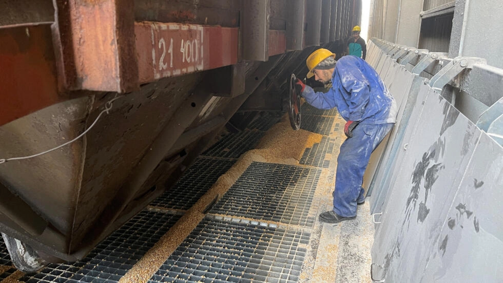 Ensuring Quality: Port Worker Inspects Ukrainian Cereal Train Carriage at Constanta, Romania's Black Sea Port, May 11, 2022.