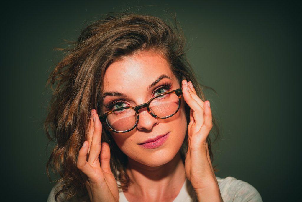 Educate Yourself portrait of woman wearing eyeglasses with black frames