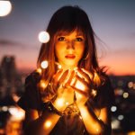 Wisdom Woman Holding Fireflies