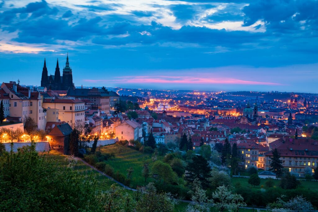 aerial view of city during night time Prague Castle Ancient Castles