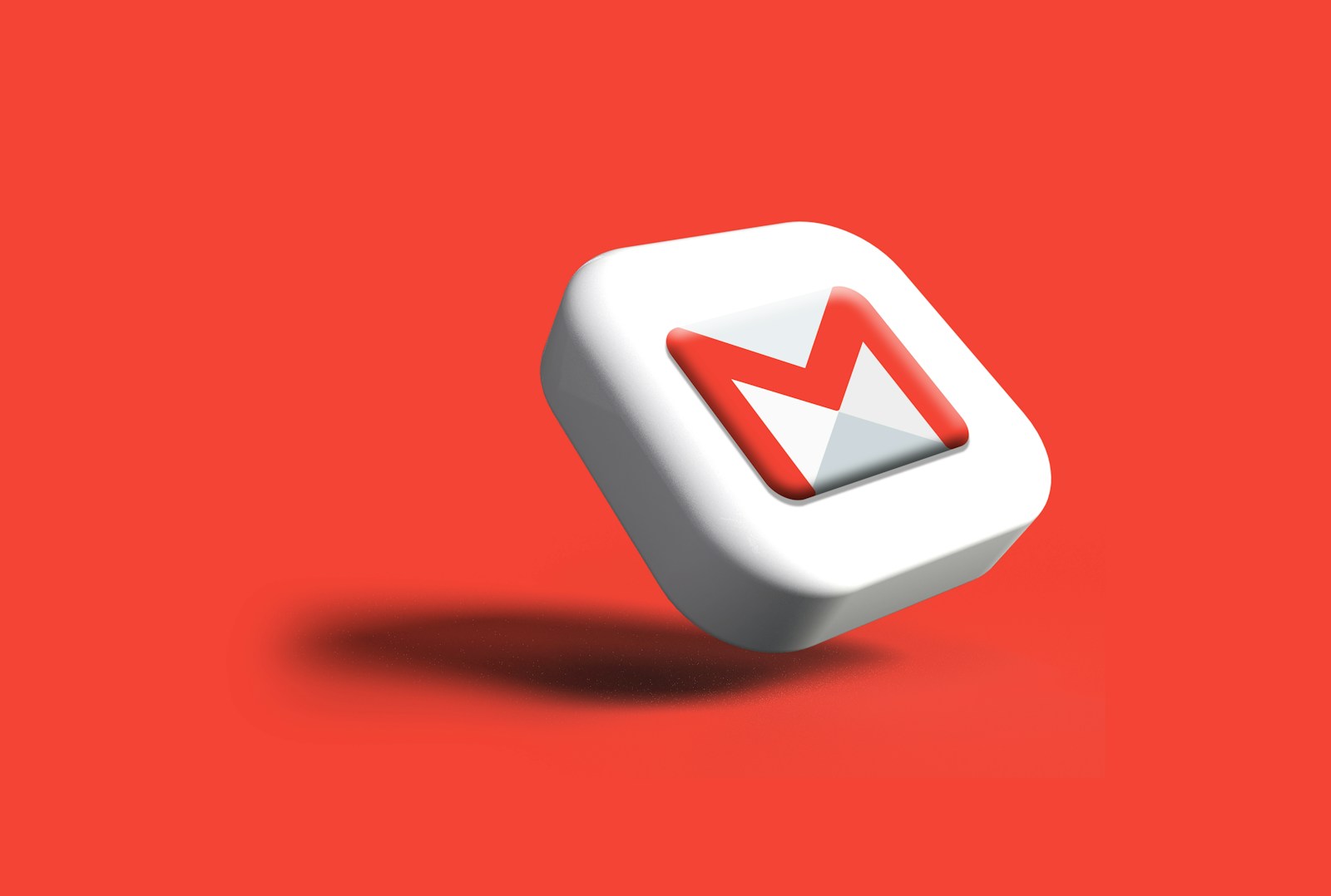 Gmail a close up of a white and red object on a red background Interface Enhancements and Redesigns