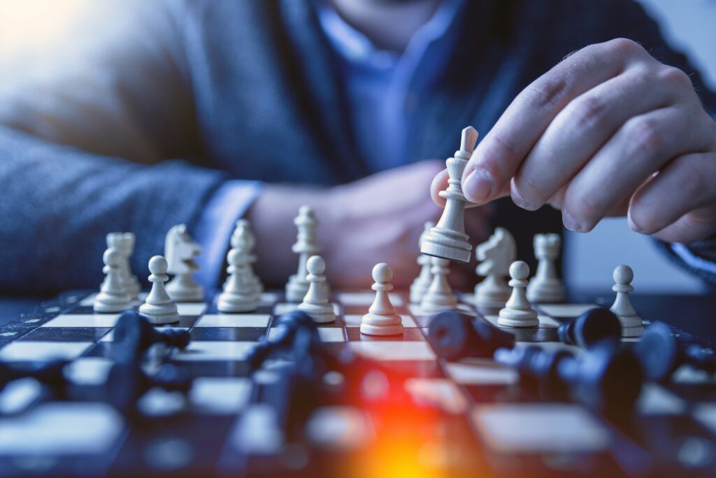 depth of field photography of man playing chess Puzzle Games Match Masters and Other Puzzle Games