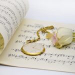 pocket watch, rose, sheet music