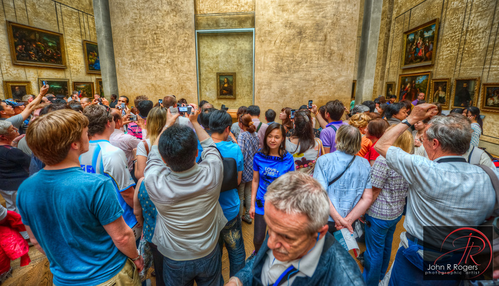 Mona Lisa at the Louvre, Paris, France. 10 Overrated Tourist Spots That Are a Waste of Time