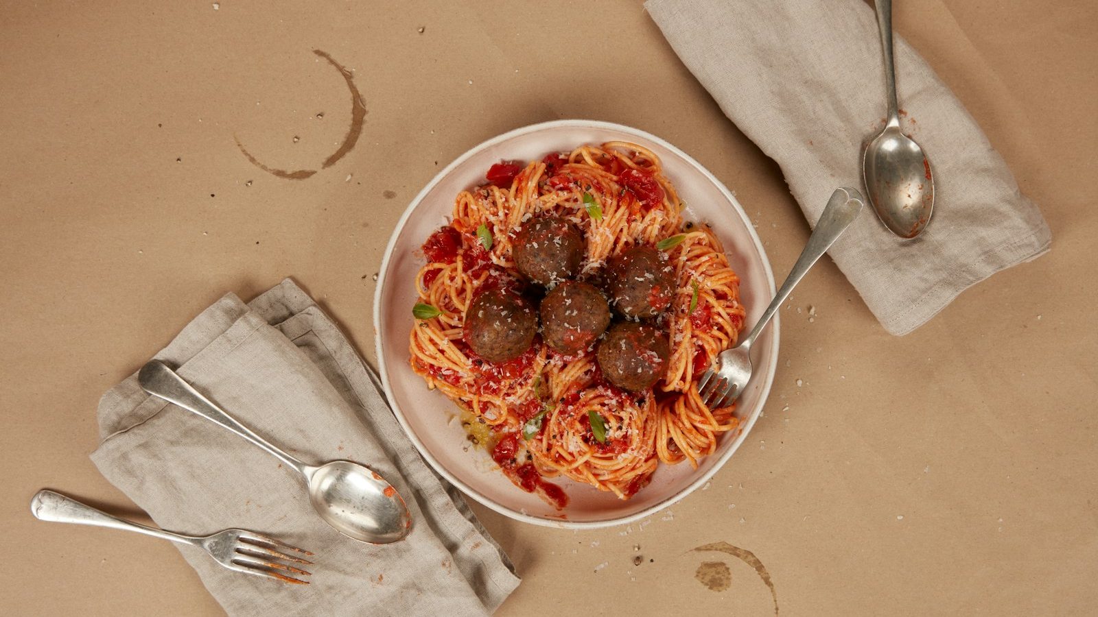 a plate of spaghetti with meatballs and sauce. 10 Delicious Foods You Must Try in 2024