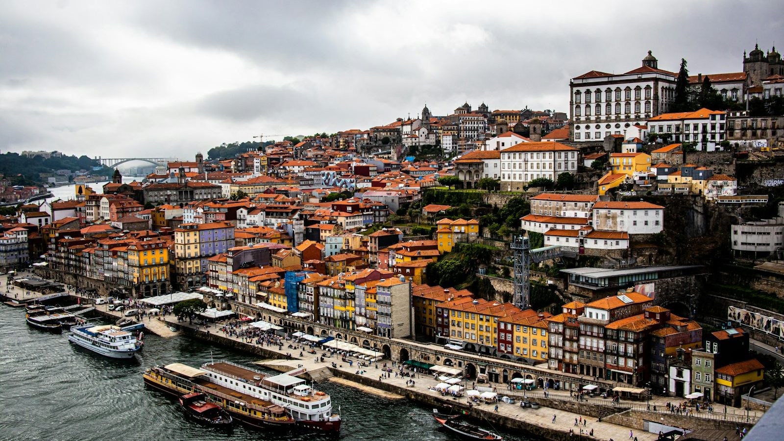 white and red boat on water near city buildings during daytime. 10 Dreamy European Cities You Have to Explore