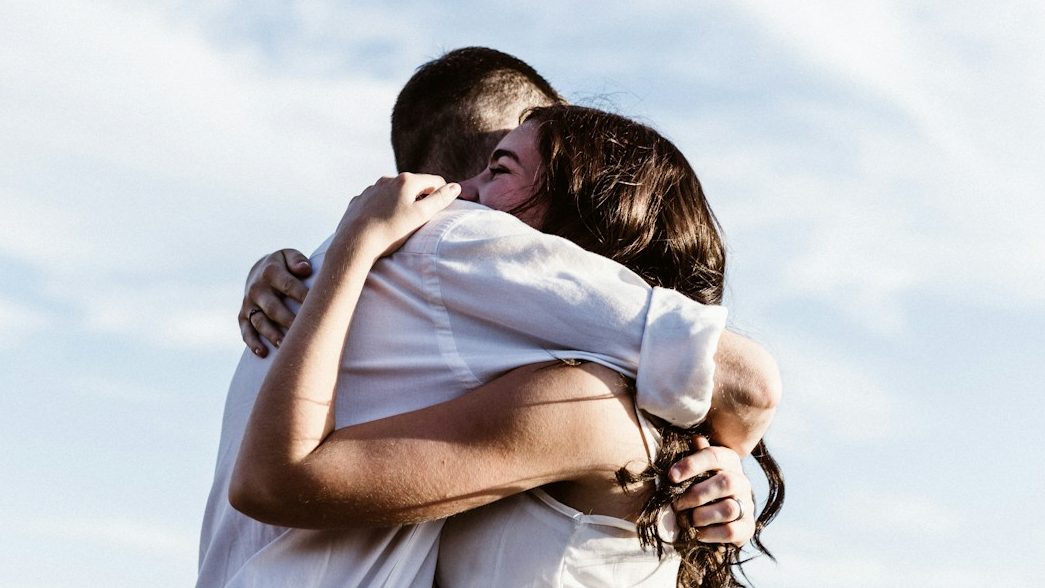 man and woman hugging each other photography. 10 Signs You’re in a Toxic Relationship