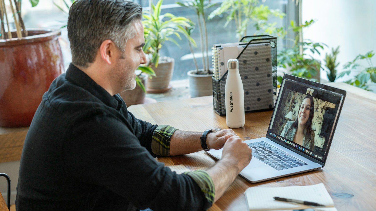 man in black sweater using macbook pro. 7 Best Ways to Improve Your LinkedIn Profile