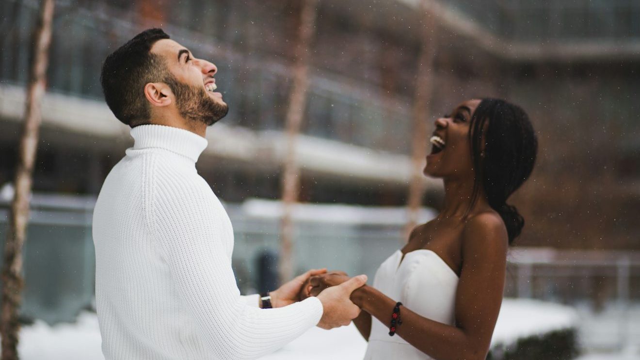 man and woman smiling. 10 Simple Habits to Build Stronger Relationships