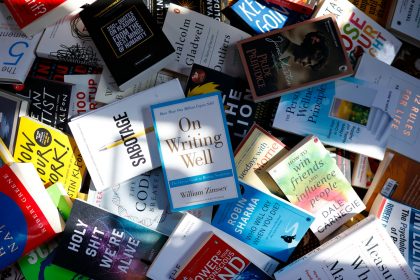 a pile of books sitting next to each other