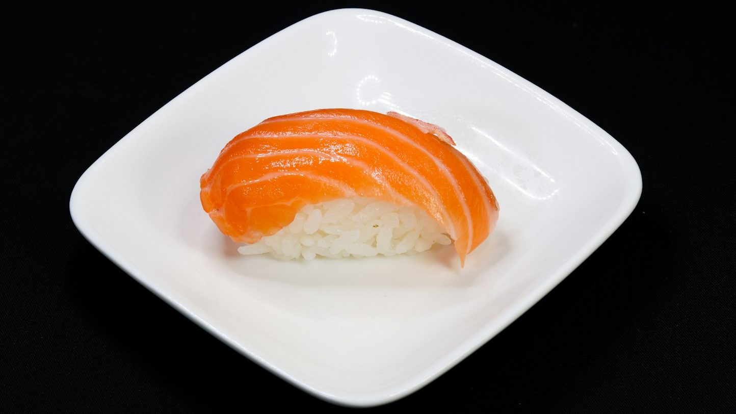 orange and white bread on white ceramic plate. 10 Delicious Foods You Must Try in 2024