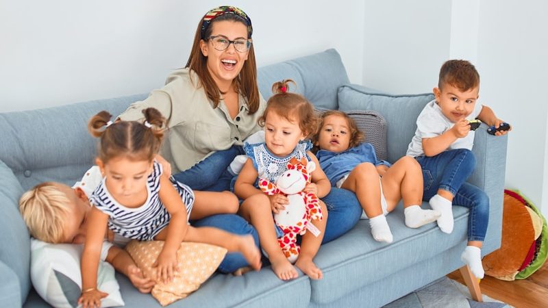 3 women sitting on gray couch. 6 Worst Mistakes Parents Make When Disciplining Children