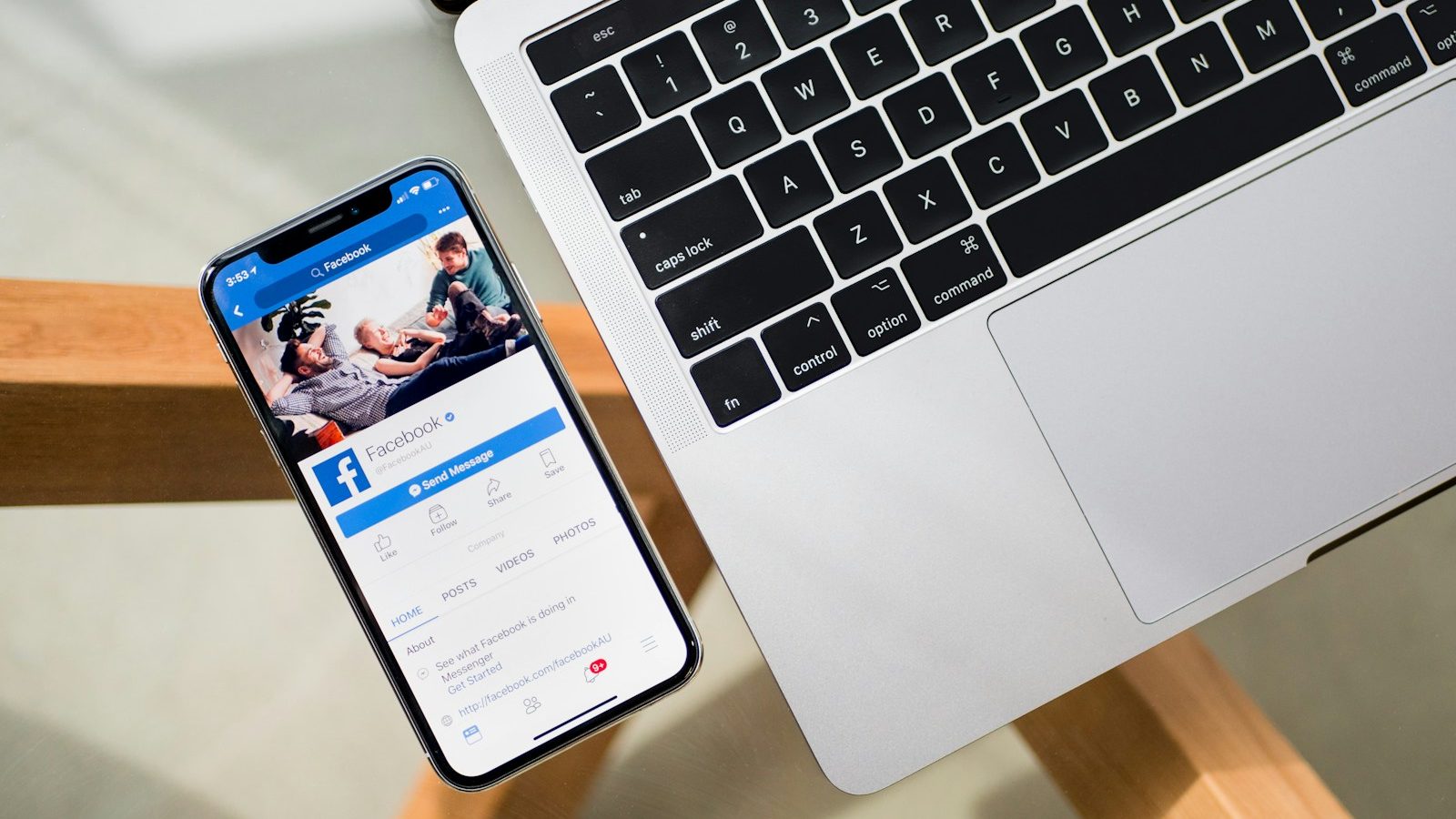 iPhone X beside MacBook. 7 Powerful Social Media Strategies for 2024