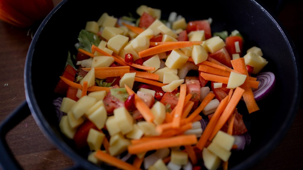 sliced carrots and green vegetable in black ceramic bowl. 10 Unbelievably Easy Recipes for Busy Weeknights