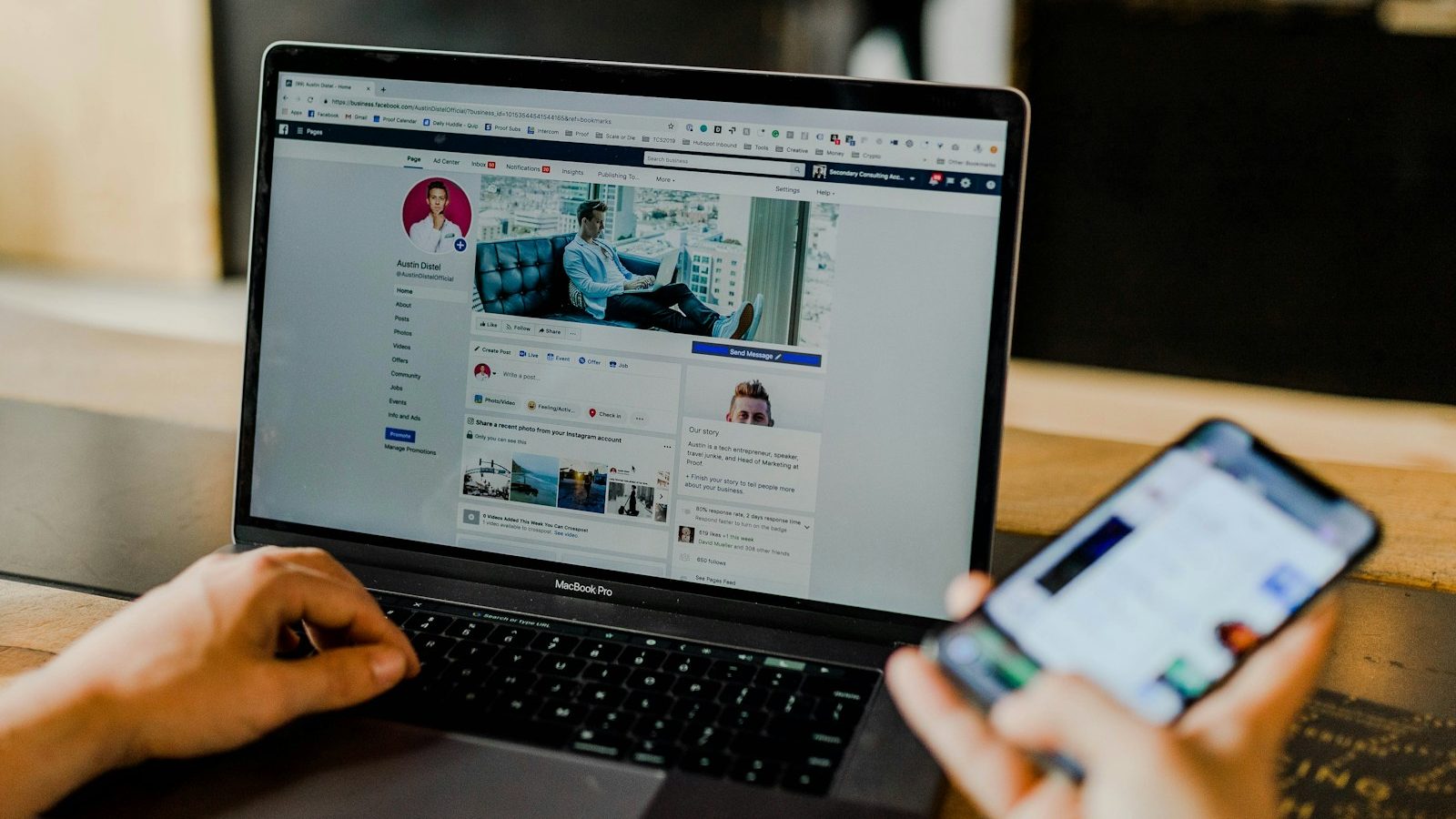 person using both laptop and smartphone. 6 Must-Know Facebook Advertising Tips for Small Businesses