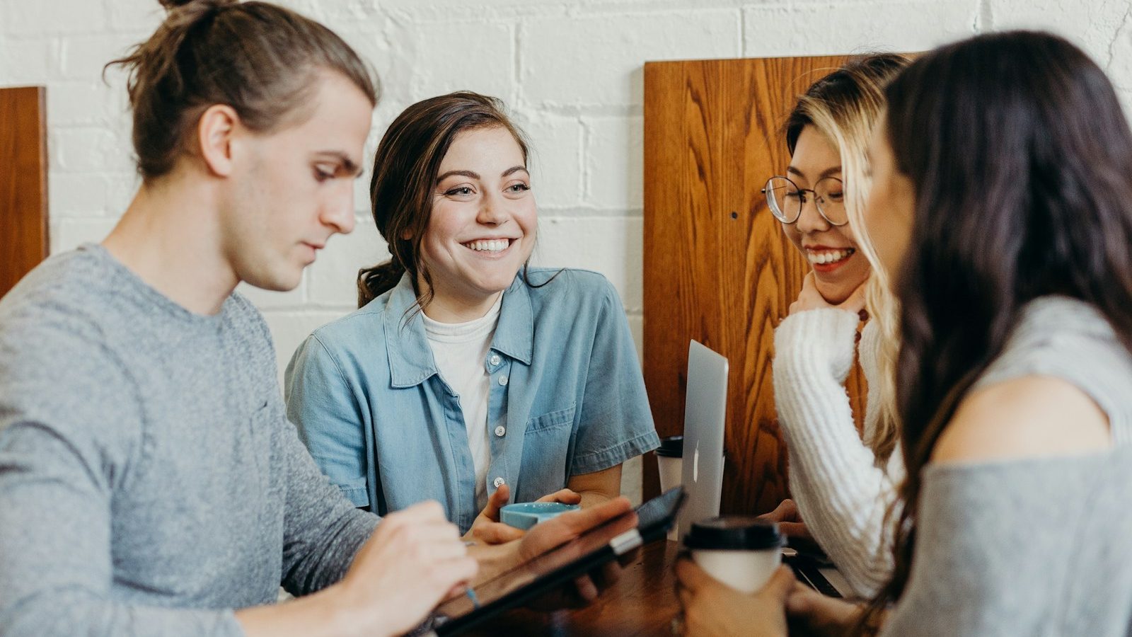 A group of friends at a coffee shop. 6 Powerful Communication Tips for Happier Relationships