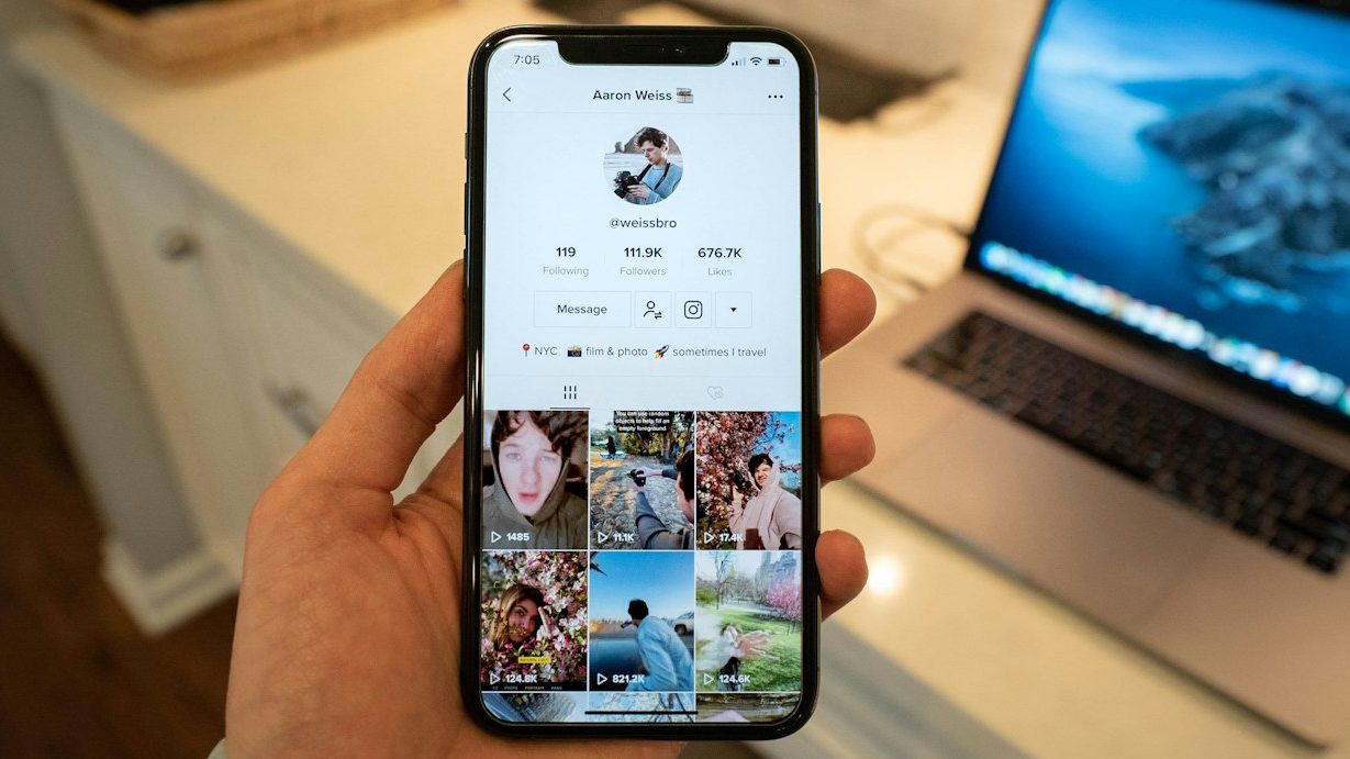 person holding white samsung galaxy smartphone. Top 10 Social Media Platforms for Creatives in 2024: The Best Places to Share, Connect, and Grow