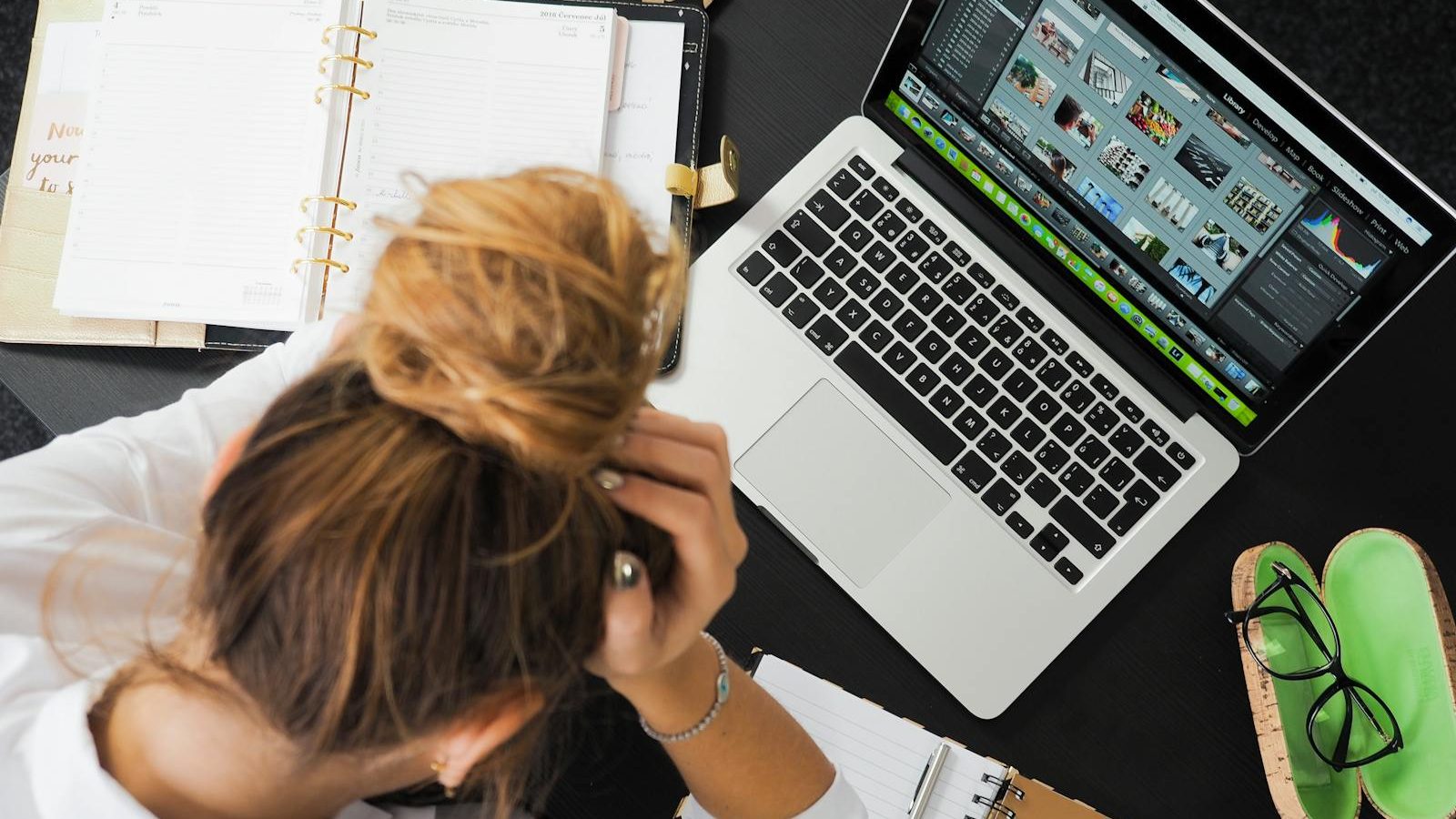 Woman Sitting in Front of Macbook