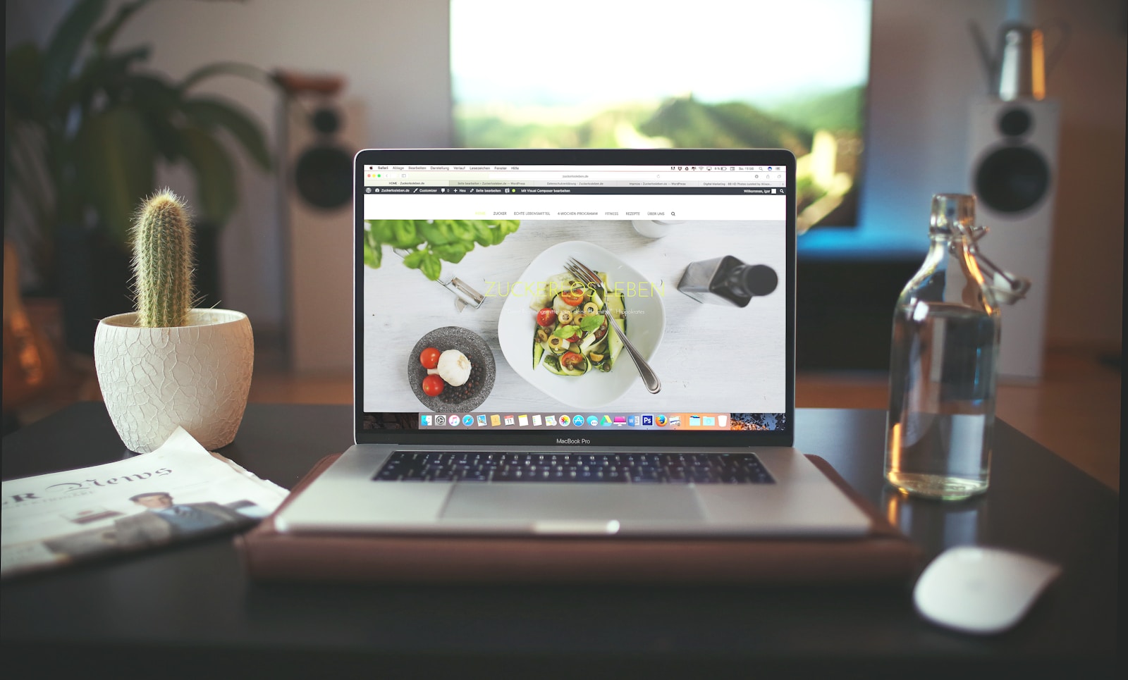 MacBook Pro showing vegetable dish, Essential Website Pages: 7 You Can't-Miss and 11 Worth Considering