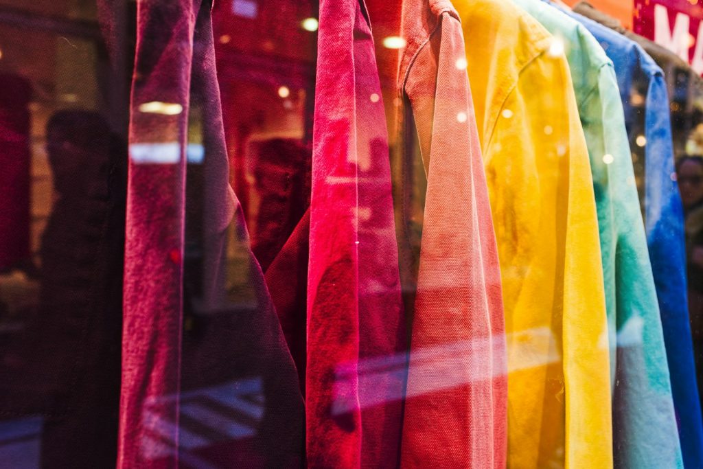 a row of colorful ties hanging in a store window, 10 Most Stunning Fashion Trends for 2024